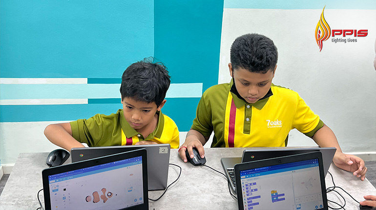 Students using computers at student care